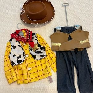 Size 3T Disney woody costume worn once. Excellent condition.